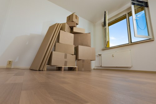 Local removal truck loading household items for transport