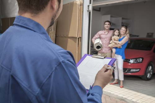 Unloading boxes and furniture at a new home in Harefield
