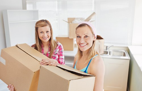Separated moving boxes and recyclables prepared for collection